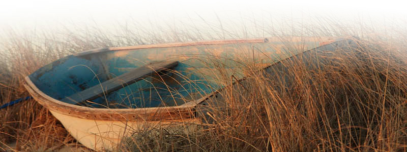 Lone Boat On Sandwich Shore